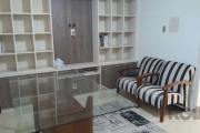 Adquira apartamento mobiliado de frente,com living 2 ambientes, piso laminado,cozinha,com churrasqueira,área de serviço,wc auxiliar,banheiro social,2 quartos, sendo um com sacada aberta.Quase esquina 