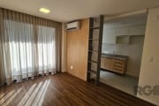 Apartamento na Rua José de Alencar, 1281, no charmoso bairro Menino Deus, Porto Alegre. Com 41,51 m² de área privativa, o imóvel conta com uma vista panorâmica incrível e sacada para relaxar. O condom