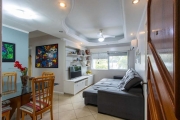 Apartamento de 2 quartos, living, cozinha planejada, área de serviço e 1 vaga.