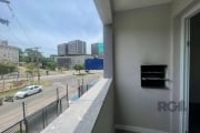 Excelente oportunidade Apartamento  impecável  living amplo com dois ambientes ,  cozinha americana  com área de serviço integrada , e sacada com churrasqueira , dois dormitórios e um banheiro social 