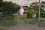 Terreno medindo 11 x 43 = 473, plano.&lt;BR&gt;Neste terreno consta uma casa ,  com living, tres dormitorios, banheiro, cozinha.&lt;BR&gt;Vamos visitar?&lt;BR&gt;Aguardo sua ligação.