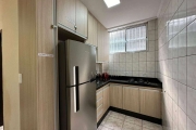 Apartamento com 2 dormitórios à venda, 49 m² por R$ 320.000 - Vila Guilhermina - Praia Grande/SP