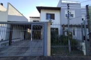 Casa Sobrado composta de 4 dormitórios, sendo 2 suítes, living dois ambientes com lareira, cozinha americana com móveis planejados, banheiro social, área de serviço coberta com churrasqueira, Pergolad