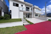 Casa com 4 dormitórios à venda, 193 m² por R$ 1.590.000,00 - Condomínio Flora Rica - Peruíbe/SP