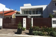 Casa em condomínio, 3 dormitórios, 2 suítes, 4 vagas de garagem no bairro Hípica, Porto Alegre/RS   &lt;BR&gt;     &lt;BR&gt;Esta deslumbrante casa oferece luxo e conforto, com uma espaçosa sala de es