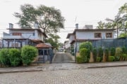 Excelente residência com 4 dormitórios, sendo uma suíte com hidro, living 2 ambientes, lavabo, cozinha americana , sala de jantar, lareira, sacada, dependência de empregada, banheiro auxiliar, 2 churr