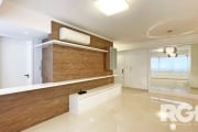 Escelente apartamento com 79 m2 de 2 dormitórios com uma suíte.&lt;BR&gt;&lt;BR&gt;Apartamento semimobiliado, amplo living com armário e churrasqueira, cozinha completa, lavanderia fechada com acesso 