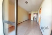 Apartamento de 2 dormitórios, sendo 1 suíte, no bairro Santana, em Porto Alegre. Sacada com churrasqueira, living amplo para 2 ambientes, banheiro social, cozinha conjugada com área de serviço e vaga 