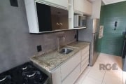 Apartamento com 2 quartos, sendo um suite.&lt;BR&gt;Living para dois ambientes e uma linda sacada, área de serviço, cozinha com churrasqueira, banheiro.&lt;BR&gt;Apartamento todo reformado.&lt;BR&gt;D