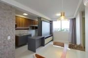 Excelente apartamento à venda, semimobliado, com 2 dormitórios (uma suíte), living integrado, cozinha  americana com churrasqueira, área de serviço, banheiro social e vaga de garagem. Imóvel arejado e