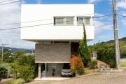 Luxuosa Casa em Condomínio de Alto Padrão com Vista Panorâmica para o Pôr do Sol no Guaíba&lt;BR&gt;&lt;BR&gt;Desfrute do privilégio de morar em um condomínio exclusivo, com uma vista deslumbrante e p