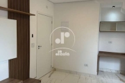 Lindo apartamento com dois dormitórios sendo um com suíte, sala, cozinha,área de serviço, elevador, todo em porcelanato, teto rebaixado.