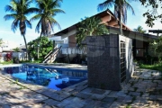 Casa frente praça a venda no Acapulco em Guarujá.