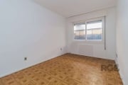 Apartamento de 1 dormitório a venda no Bairro Auxiliadora.&lt;BR&gt;excelente apartamento de 1 dormitório, sala, cozinha completa, armários, geladeira, freezer, fogão, microondas e aquecedor novo, ban