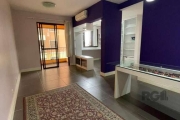 Excelente apartamento semi mobiliado com 3 dormitórios, transformado em 2,  living 2 ambientes, sacada com churrasqueira, cozinha americana, área de serviço ampla, 1 vaga de garagem coberta e escritur