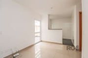 Excelente apto. de 49,00m2  ,  2 dormitórios, fundos, área de serviço, cozinha americana , pátio, piso porcelanato, com 1 vaga de garagem descoberta. Em condominio de predios fechado.