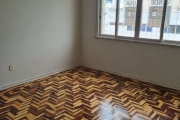 Apartamento 2 dormitórios, sala dois ambientes, cozinha e área de serviço. Com garagem escriturada. Marque sua visita.