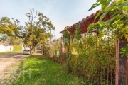 Casa com 3 quartos à venda na Rua dos Guenoas, 1113, Guarujá, Porto Alegre