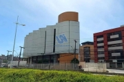 Prédio Comercial Prédio com 3.164m² de área total, 07 pavimentos e 2.055m² de salas e loja.