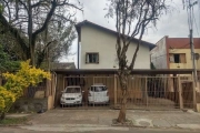 Excelente sobrado em condomínio pequeno no bairro Sarandi, com 3 dormitórios, sendo 1 transformado em closet, living, sala de jantar e cozinha americana integrados, lavabo, área coberta com churrasque