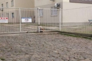 Apartamento na entrada da Restinga no terceiro pavimento, com dois dormitórios, uma vaga de garagem coberta, portaria 24h. Pátio amplo.  Agende já sua Visita!