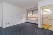 apartamento JK com sala-quarto com janelão, carpete, cozinha, lavanderia e banheiro. No bairro Passo da Areia , térreo, área privativa 27,97, condomínio fechado com grades, portão eletrônico, jardim, 