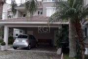 Excelente casa em condomínio fechado, às margens do rio guaíba, com acesso privativo ao rio.casa mobiliada, com 3 dormitórios, sendo 1 suíte master com 36 m², banheiro com banheira e piso aquecido.liv