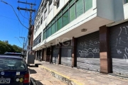 DEPÓSITO/PAVILHÃO/LOJÃO COM 1300 M2, NA AV. BENTO GONÇALVES. &lt;BR&gt;Possui área privativa de 1300m²,  sendo a loja com 980m² e o primeiro andar com 320m². &lt;BR&gt;O primeiro andar está alugado pa