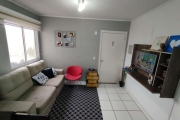 Lindo Apartamento em andar alto, 2 dormitórios, sala e cozinha integrada, banheiro social com box de vidro, 1 vaga de garagem, fica moveis planejados da cozinha, condomínio com infra, playground, quad