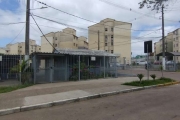 Apartamento no bairro Vila Nova, de 2 dormitórios, living para 2 ambientes, cozinha e banheiro social. Condomínio com portaria, quiosque com churrasqueira, mercado self-service, academia ao ar livre, 