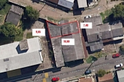 Terreno com 133 m², contendo conjunto de salas comerciais, são 4 unidades, cada uma com aproximadamente 33 m², todas com entradas individuas ótimo para investimento, necessitam de algumas reformas, bo