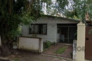 Vendo excelente terreno na melhor localização do bairro Jardim Botânico.&lt;BR&gt;Medindo 10 x 27 m, no total de 270 m2., constitui uma casa com 2 dormitórios ,sala, cozinha e banheiro.&lt;BR&gt;Nos f