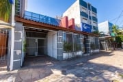 Prédio Comercial com 500 m², situado na  Av. Plínio Brasil Milano. Possui garagem , 04 banheiros,  amplo espaço que pode ser usado como escritório, sala de reuniões e ao fundo espaço que pode ser usad