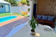 Casa térrea de Alto Padrão à venda no bairro Teresópolis.&lt;BR&gt;São 207 m² construídos, distribuídos em um terreno de 12 x 33. Uma casa térrea, moderna, com acabamentos impecáveis, sofisticada, fun