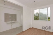 Apartamento 2 dormitórios,  living 2 ambientes, área serviço separada, cozinha americana com churrasqueira, laminado pronto para morar, prédio semi novo, com portaria, salão festas, quadra de esportes