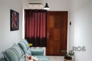 Apartamento 2 dormitórios, bem iluminado e arejado e 1 vaga de garagem escriturada. Conta ainda com, banheiro social, sala p/2 ambientes: estar/jantar, cozinha e área de serviço separada. &lt;BR&gt;Ex