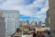 Vende apartamento 3 dormitórios dois com roupeiro, living dois ambientes na região central, arejado, iluminado, cozinha com armários e tanque, área de serviço com armário, piso parquet, sol da tarde, 