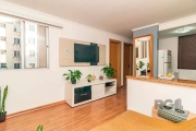 Apartamento no bairro Jardim Leopoldina Aconchegante apartamento com 2 dormitórios, sala ampla para 2 ambientes, cozinha estilo americana, conceito aberto e 1 banheiro, pintado recentemente, andar com