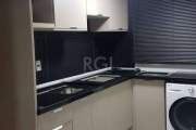 Descubra o seu novo lar no Sítio Jundiaí, localizado na tranquila Estrada João de Oliveira Remião, nº 2190, no bairro Agronomia, em Porto Alegre. Este aconchegante apartamento de 47 m² possui uma exce