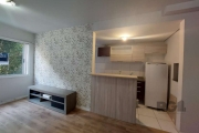 Lindo apartamento, 2 dormitórios, banheiro, sala de estar com living para 2 ambientes, cozinha americana com churrasqueira e geladeira, área de serviço integrada. Piso todo em laminado. Ar condicionad