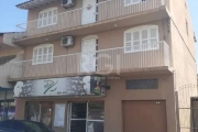 Prédio com 3 pavimentos, possui uma loja, 2 apartamentos e 1 garagem, segue as descrições:&lt;BR&gt;Térreo: Loja com 70m², garagem de 30m² (2 vagas) e nos fundos possui uma meia água de 1 dormitório, 