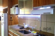 Apartamento 2 quartos no bairro Medianeira, reformado.  &lt;BR&gt;Cozinha, quartos e banheiro com móveis sob medida&lt;BR&gt;Ótima insolação, leste/norte.&lt;BR&gt;01 Vaga fixa.