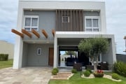 Conheça esta espetacular casa à venda no Condomínio Blue, em Xangri-Lá. Com 185 m² de área privativa, esta residência é perfeita para quem busca conforto e sofisticação. Situada em um bairro tranquilo