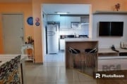 Apartamento semi mobiliado, 2 dormitórios, living 2 ambientes integrados a cozinha planejada, área de serviço e banheiro social. Ficam moveis sob medida da cozinha, bancada, painel da TV, banheiros e 