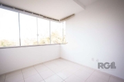 Excelente apartamento de 61m² com amplo living para dois ambientes, 2 dormitórios, banheiro social com ventilação natural, cozinha americana com churrasqueira, área de serviço separada e 1 vaga de gar