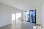 Loft de alto padrão construtivo no bairro Moinhos de Vento, planta de 24 m2 privativos com porcelanato e aberturas em alumínio.
