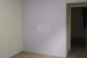 Lindo apartamento de 1 dormitório, living 2 ambientes, banheiro, cozinha e área de serviço conjugada. &lt;BR&gt;Condomínio  muito bem localizado!