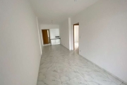 Apartamento com 2 dormitórios à venda, 65 m² por R$ 430.000,00 - Caiçara - Praia Grande/SP