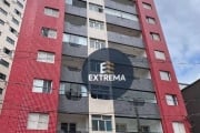 Apartamento com 2 dormitórios à venda, 62 m² por R$ 385.000 - Vila Guilhermina - Praia Grande/SP