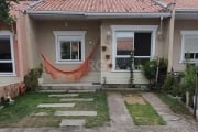 Ótima casa térrea de 2 dormitórios, banheiro c/box de vidro, sala, piso laminado, cozinha, área de serviço, pátio metade fechada com vidro mais sofá feito de tijolo outra metade ar livre com piso frio